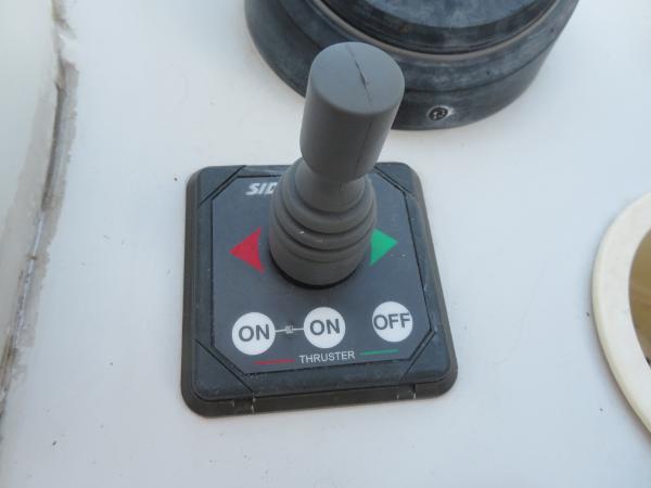 Slide: The Image of Joystick control panel of a 2000 Bluewater 5800 boat thruster. - 48