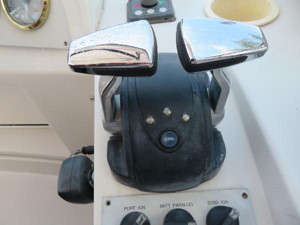 Slide: The Image of Boat throttle controls on a 2000 Bluewater 5800 yacht. - 49