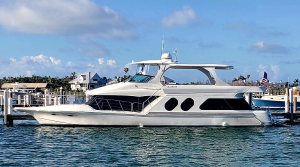 Slide: The Image of Luxury Bluewater 5800 yacht docked at marina, 2000 model. - 8