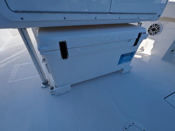 Slide: The Image of 2024 Bluewater Sportfishing 2850 boat deck with Engel cooler. - 23