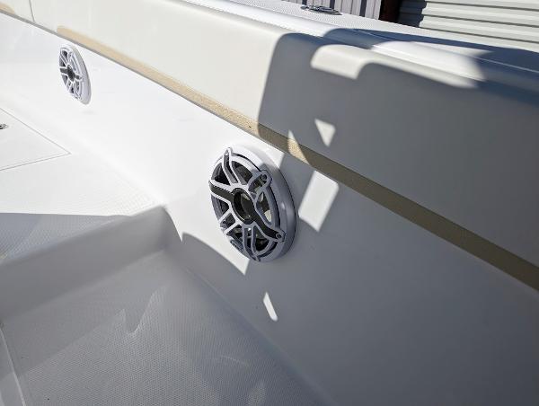 Slide: The Image of 2024 Bluewater Sportfishing 2850 boat interior with built-in speakers. - 7
