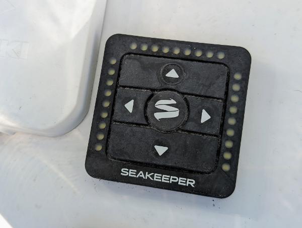Slide: The Image of Seakeeper control panel on a 2024 Bluewater Sportfishing 2850 boat. - 9