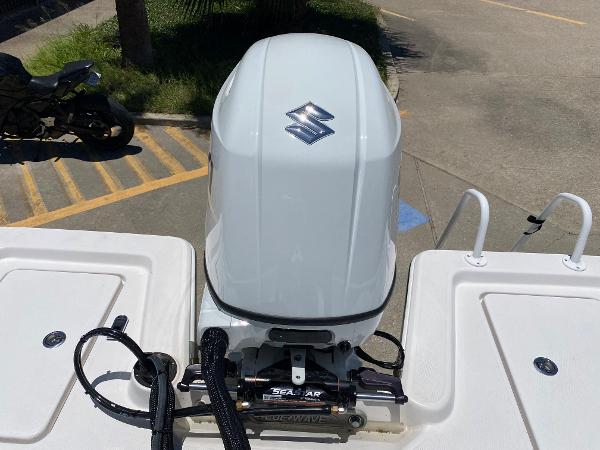 Slide: The Image of 2023 Blue Wave 2200 STL boat with Suzuki outboard motor. - 21