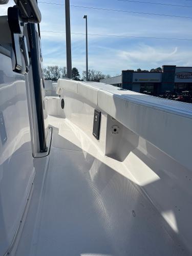 Slide: The Image of 2023 Blue Wave 2600 Makaira boat interior, white deck and side rail. - 5