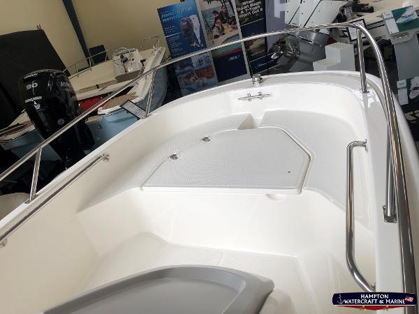 Slide: The Image of 2023 Boston Whaler 130 Super Sport boat interior at Hampton Watercraft & Marine. - 5
