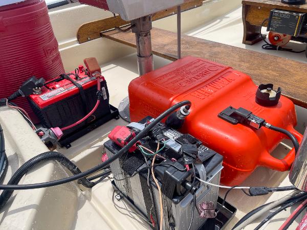 Slide: The Image of 1976 Boston Whaler 150 Sport boat interior with battery and fuel tank. - 9