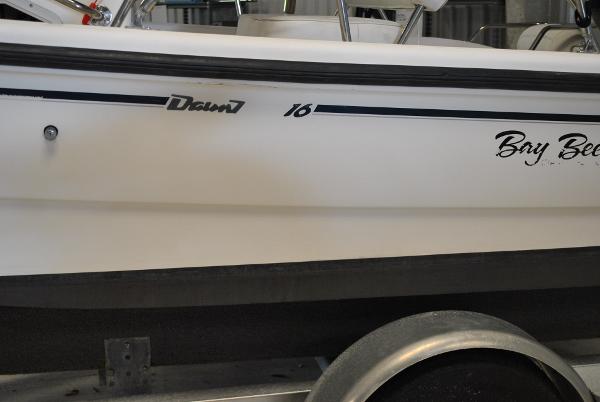 Slide: The Image of 2001 Boston Whaler 16 Dauntless boat side view on trailer. - 4