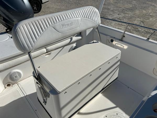 Slide: The Image of Boston Whaler 220 Dauntless 2007 boat seat and storage compartment. - 16
