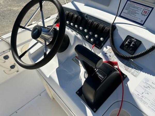 Slide: The Image of Boston Whaler 220 Dauntless 2007 boat console with steering wheel and controls. - 20