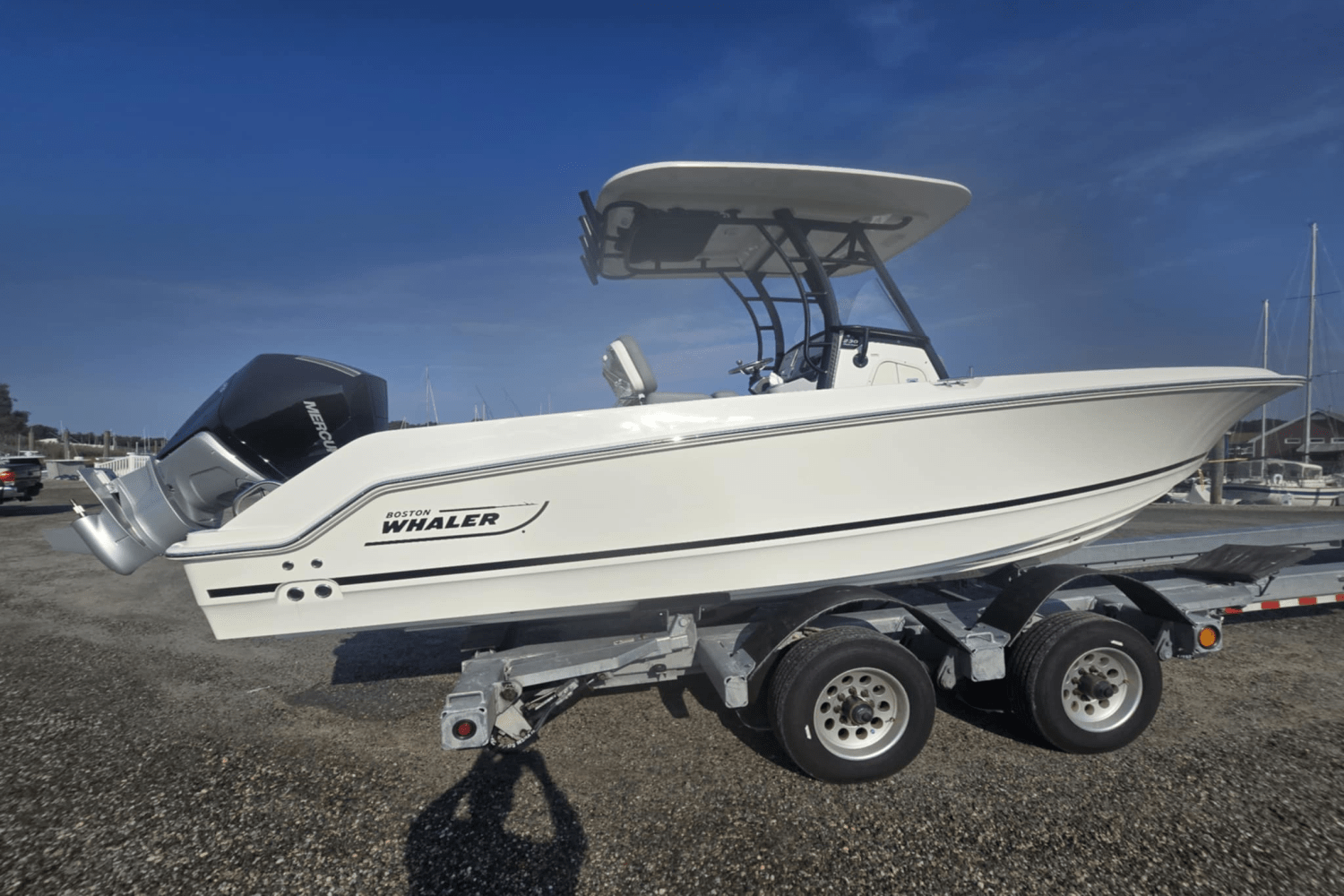 Slide: The Image of Boston Whaler 230 Outrage 2025 - 2