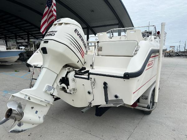 Slide: The Image of 1998 Boston Whaler 23 Conquest with Evinrude 250 outboard motor. - 2