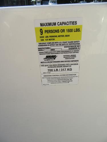 Slide: The Image of 2019 Boston Whaler 240 Dauntless capacity label, 9 persons or 1500 lbs. - 17