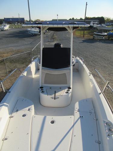 Slide: The Image of 2019 Boston Whaler 240 Dauntless boat with center console and T-top. - 4
