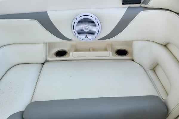 Slide: The Image of Boston Whaler 320 Outrage 2008 boat interior with speaker and cup holders. - 25