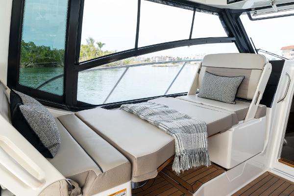 Slide: The Image of Luxurious seating area on the 2025 Boston Whaler 365 Conquest boat. - 32