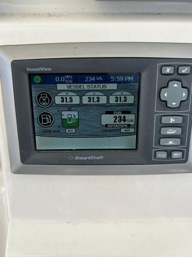 Slide: The Image of SmartCraft VesselView display on a 2013 Boston Whaler 370 Outrage showing vessel status. - 13