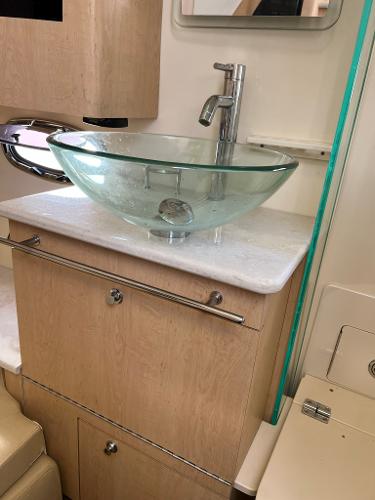 Slide: The Image of Modern bathroom sink in 2013 Boston Whaler 370 Outrage boat. - 22