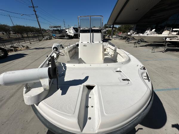 Slide: The Image of 2000 Boston Whaler Outrage 18 boat on display in a marina. - 10