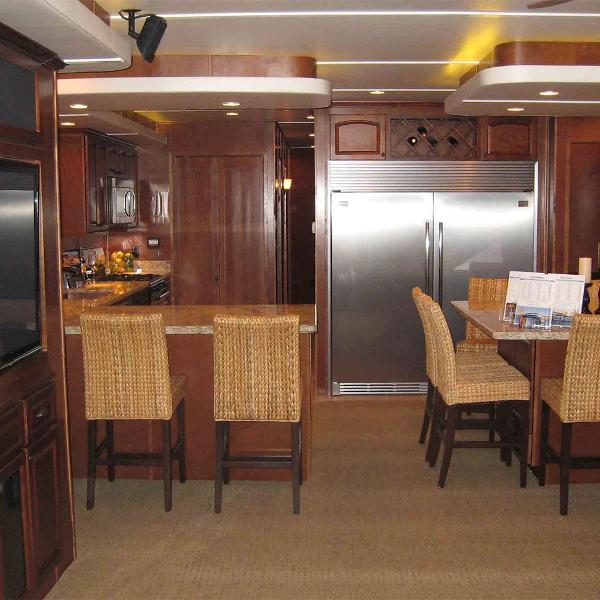 Slide: The Image of Luxurious kitchen interior of 2011 Bravada Dream Weaver Trip 15 houseboat with modern appliances. - 2