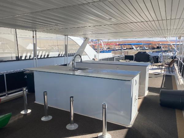 Slide: The Image of Luxurious 2012 Bravada Ho'Okipa yacht deck with modern amenities and shared ownership. - 10