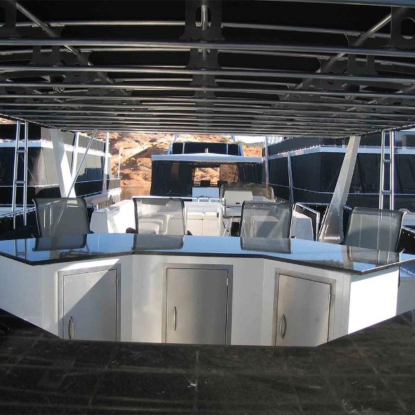 Slide: The Image of 2010 Bravada Houseboat Dream Catcher SHARE #16 with modern outdoor seating area. - 11
