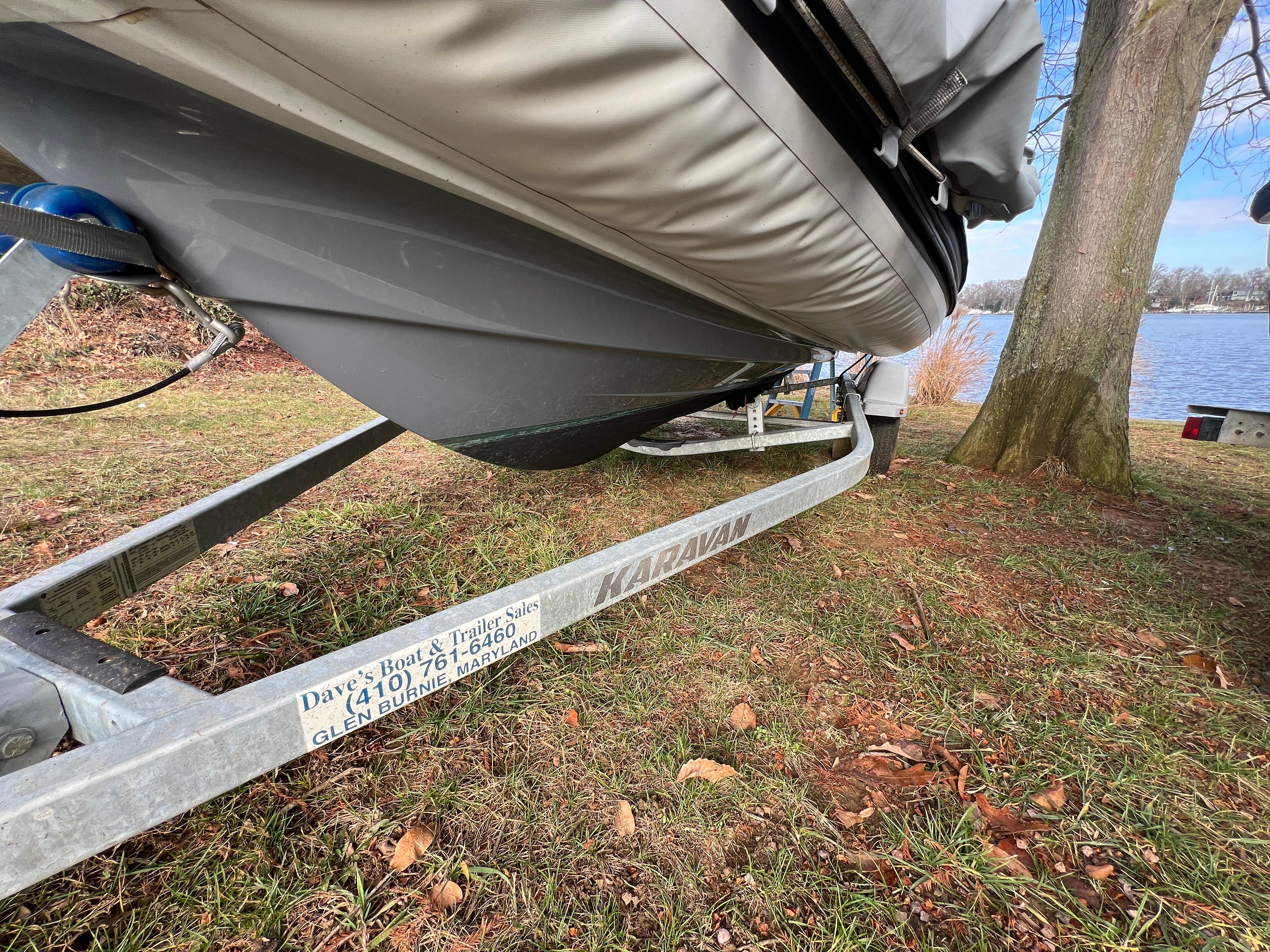 Slide: The Image of 2021 Brig Inflatables Navigator 520 on Karavan trailer by a lakeside. - 12