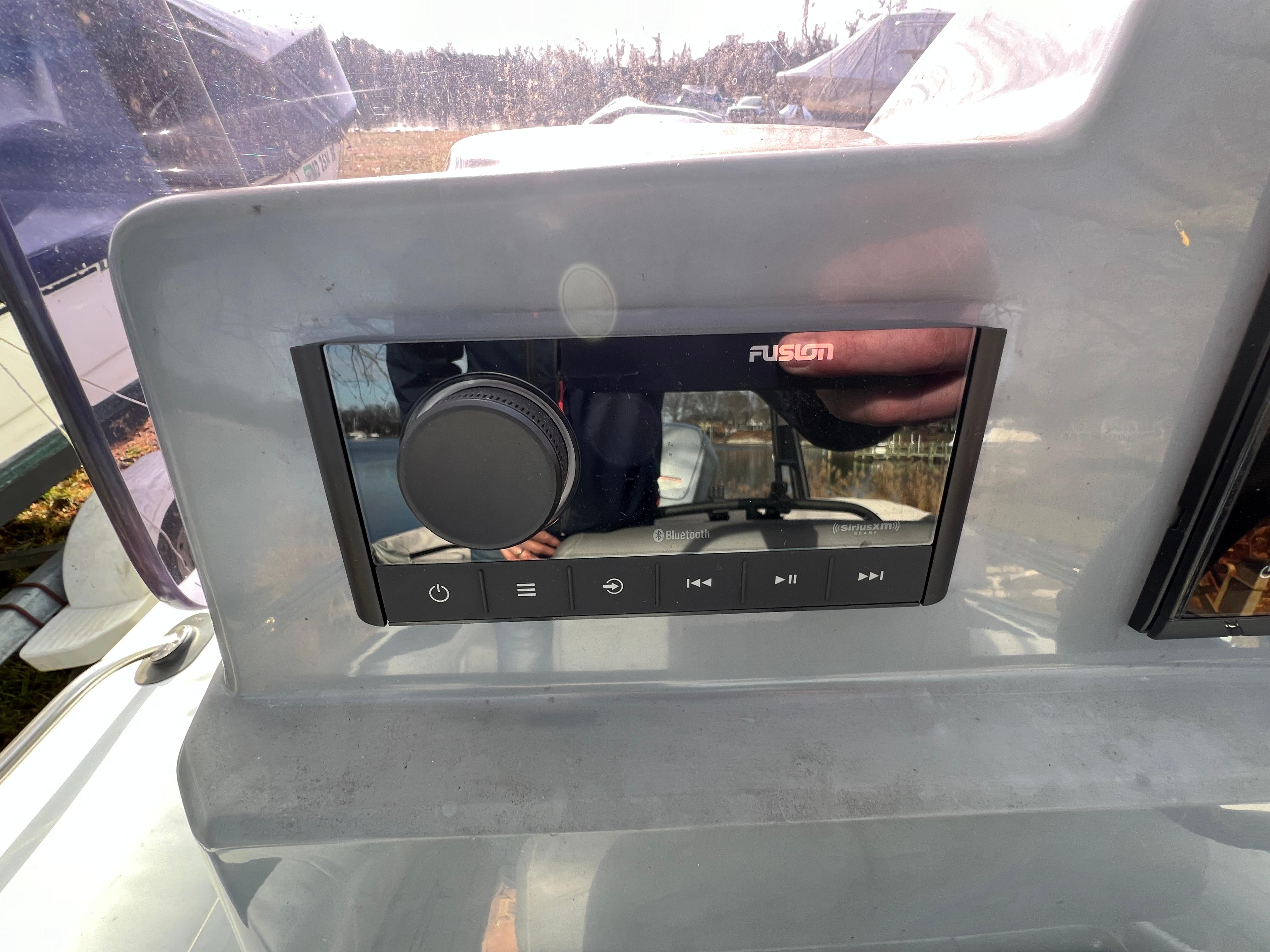 Slide: The Image of Fusion audio system on a 2021 Brig Inflatables Navigator 520 boat. - 7