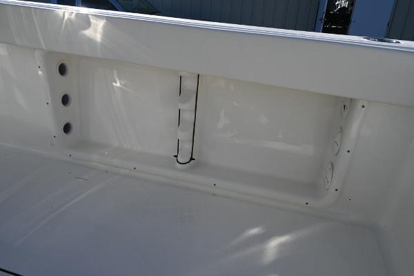 Slide: The Image of Interior view of a 2025 Bulls Bay 255CC boat, showcasing storage compartments. - 14