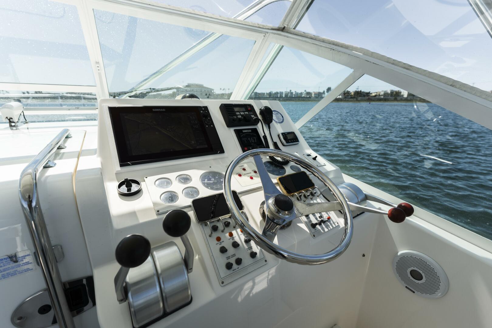 Slide: The Image of 2003 31 Cabo Express - Ramble On Helm - 5158528