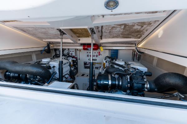 Slide: The Image of Engine room of a 2013 Cabo 36 Express boat with twin engines. - 12