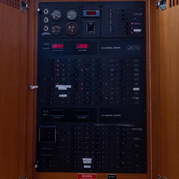 Slide: The Image of Electrical control panel on a 2005 Cabo 40 Express boat. - 28