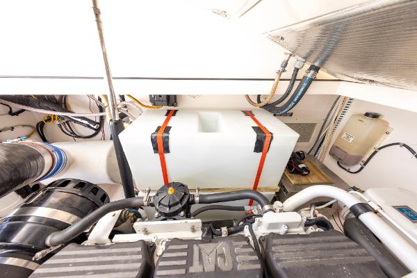 Slide: The Image of Engine room of 2005 Cabo 40 Express boat with visible components and wiring. - 37