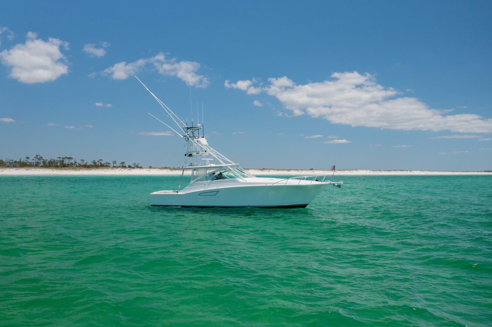 Slide: The Image of 2000 Cabo 45 Express TAIL WALKER-STBD Profile - 4350872