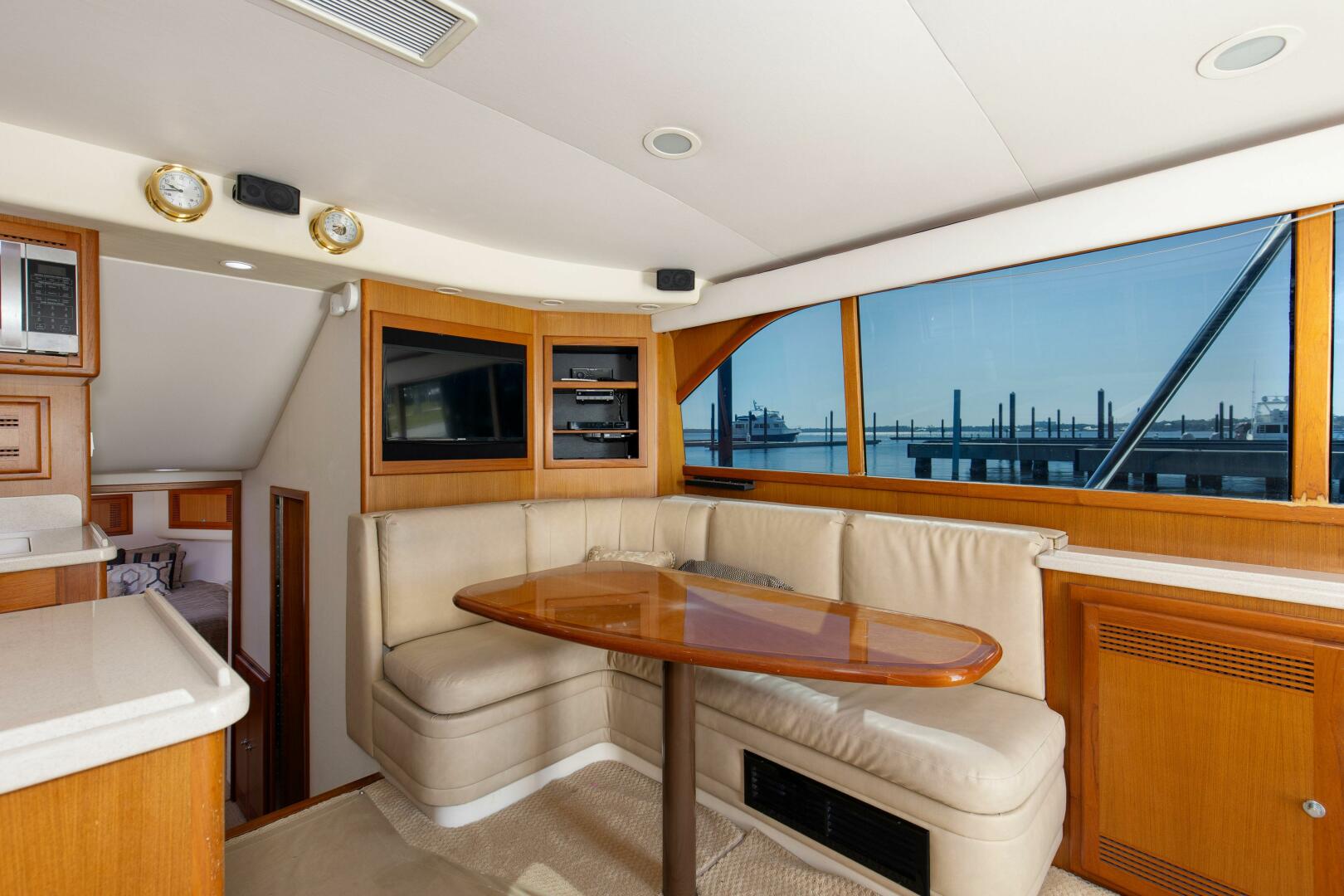 Slide: The Image of Cabo 47 Sea Magic - Interior Dinette 2001 Cabo 47 Convertible Sea Magic - 5269357