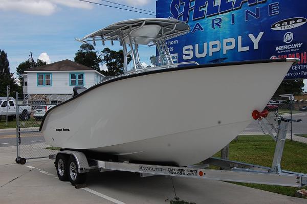 Slide: The Image of 2025 Cape Horn 22 OS boat on trailer at dealership. - 0