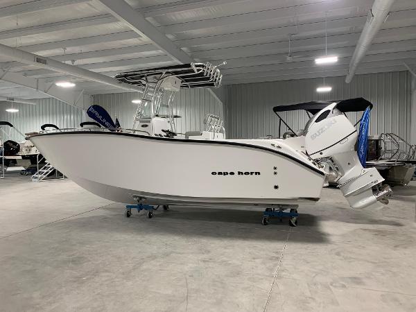 Slide: The Image of 2024 Cape Horn 22 OS boat in a showroom, side view. - 0