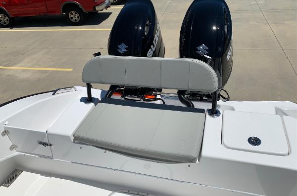 Slide: The Image of 2024 Cape Horn 24 XS boat with dual Suzuki outboard engines and rear seating. - 14