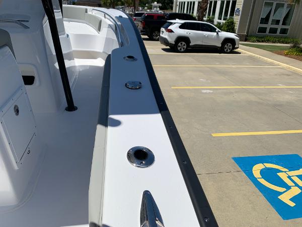 Slide: The Image of 2024 Cape Horn 24 XS boat in parking lot, side view. - 23