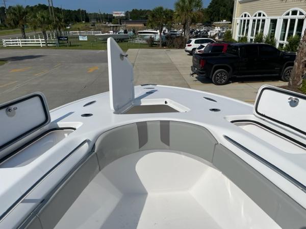 Slide: The Image of 2024 Cape Horn 31T boat bow with open storage compartments. - 30