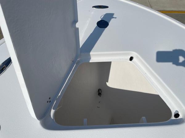 Slide: The Image of 2024 Cape Horn 31T boat storage compartment with open hatch. - 31