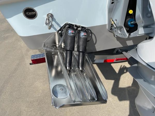 Slide: The Image of 2024 Cape Horn 31T boat with trim tabs and hydraulic actuators. - 5