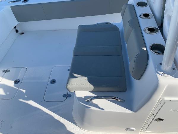 Slide: The Image of 2024 Cape Horn 31T boat interior seating and storage compartments. - 7