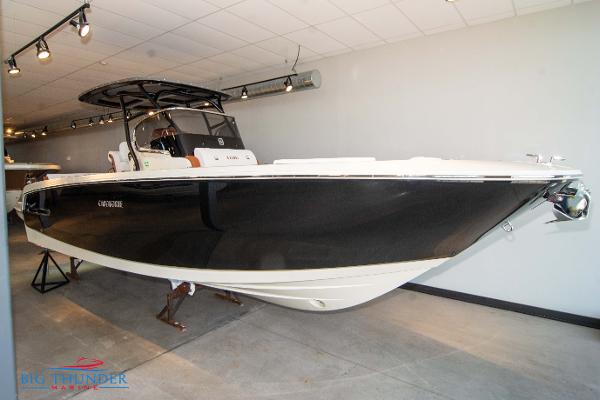 Slide: The Image of 2024 Capoforte SX280I boat displayed indoors. - 0