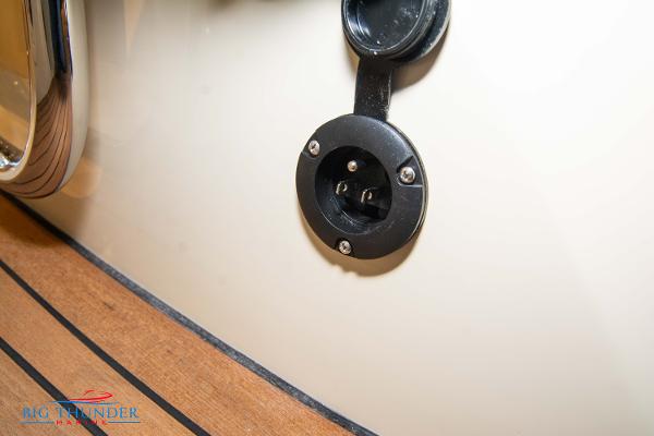 Slide: The Image of 2024 Capoforte SX280I boat power outlet on wooden deck. - 12
