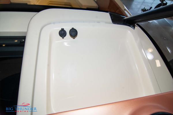 Slide: The Image of Capoforte SX280I 2024 boat storage compartment with dual power outlets. - 43