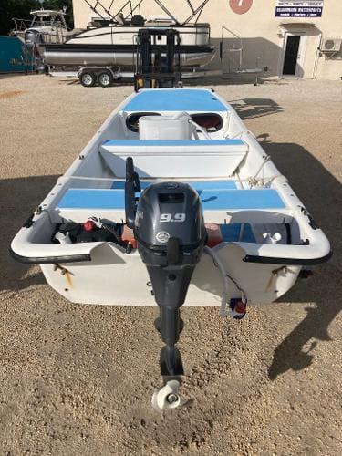 Slide: The Image of 1997 Carolina Skiff 16 DLX boat with 9.9 HP outboard motor. - 7