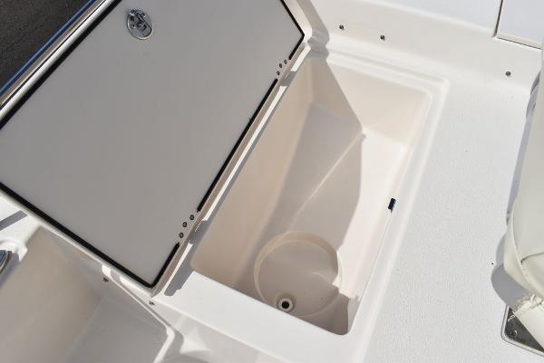 Slide: The Image of 2021 Carolina Skiff 19 LS boat storage compartment, open and empty. - 45