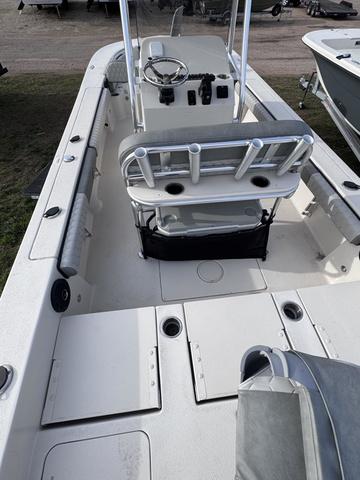 Slide: The Image of 2025 Carolina Skiff 22 Ultra Elite boat interior with seating and steering console. - 17