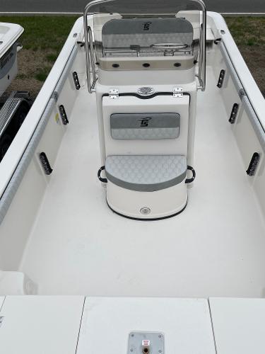 Slide: The Image of 2024 Carolina Skiff 23 LS boat interior with seating and console. - 13