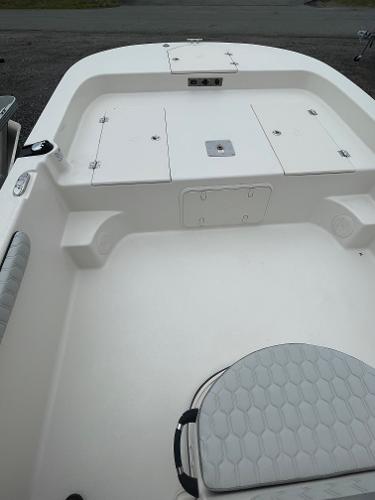 Slide: The Image of 2024 Carolina Skiff 23 LS boat interior with storage compartments. - 7